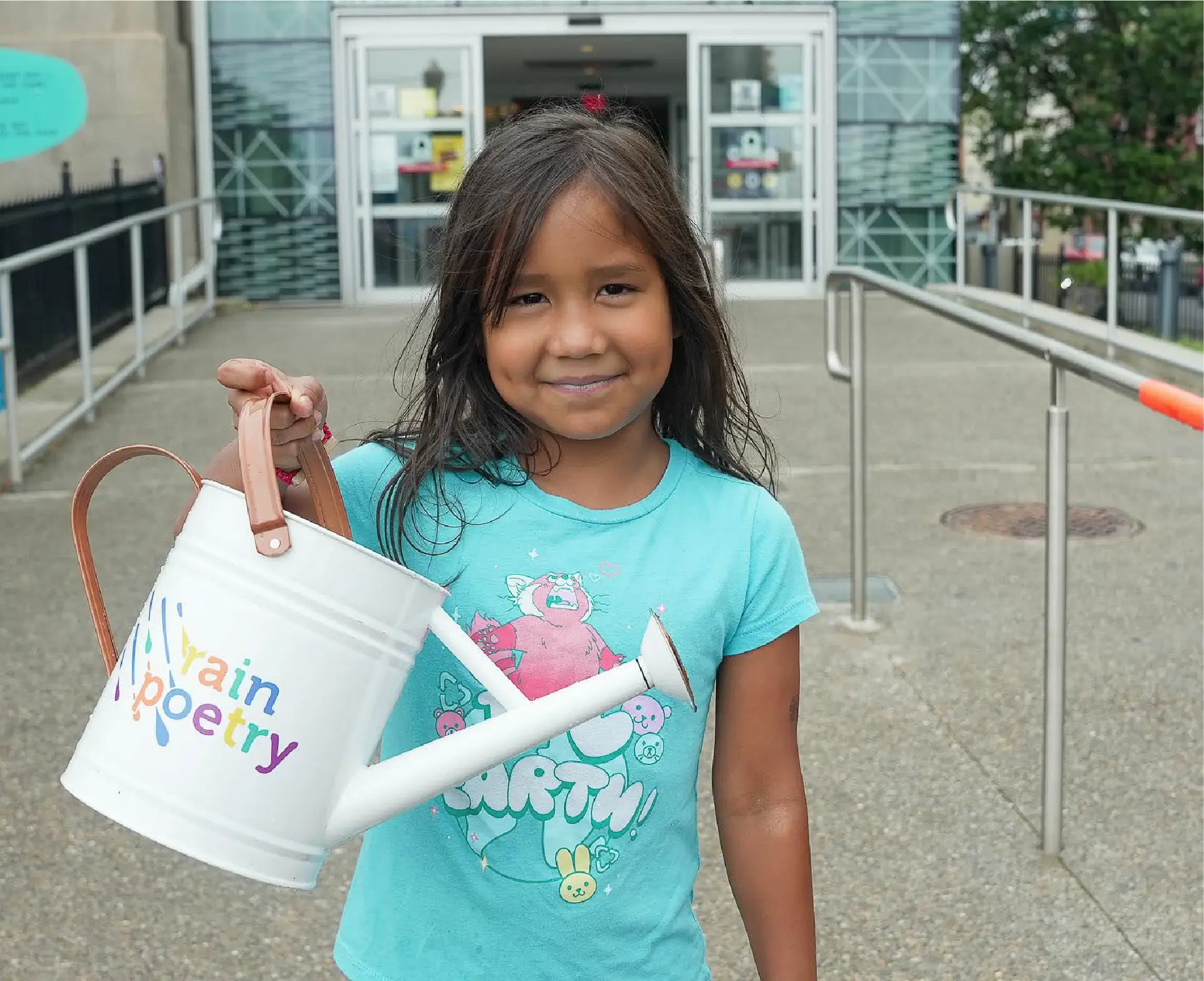 Girl holding a bucket